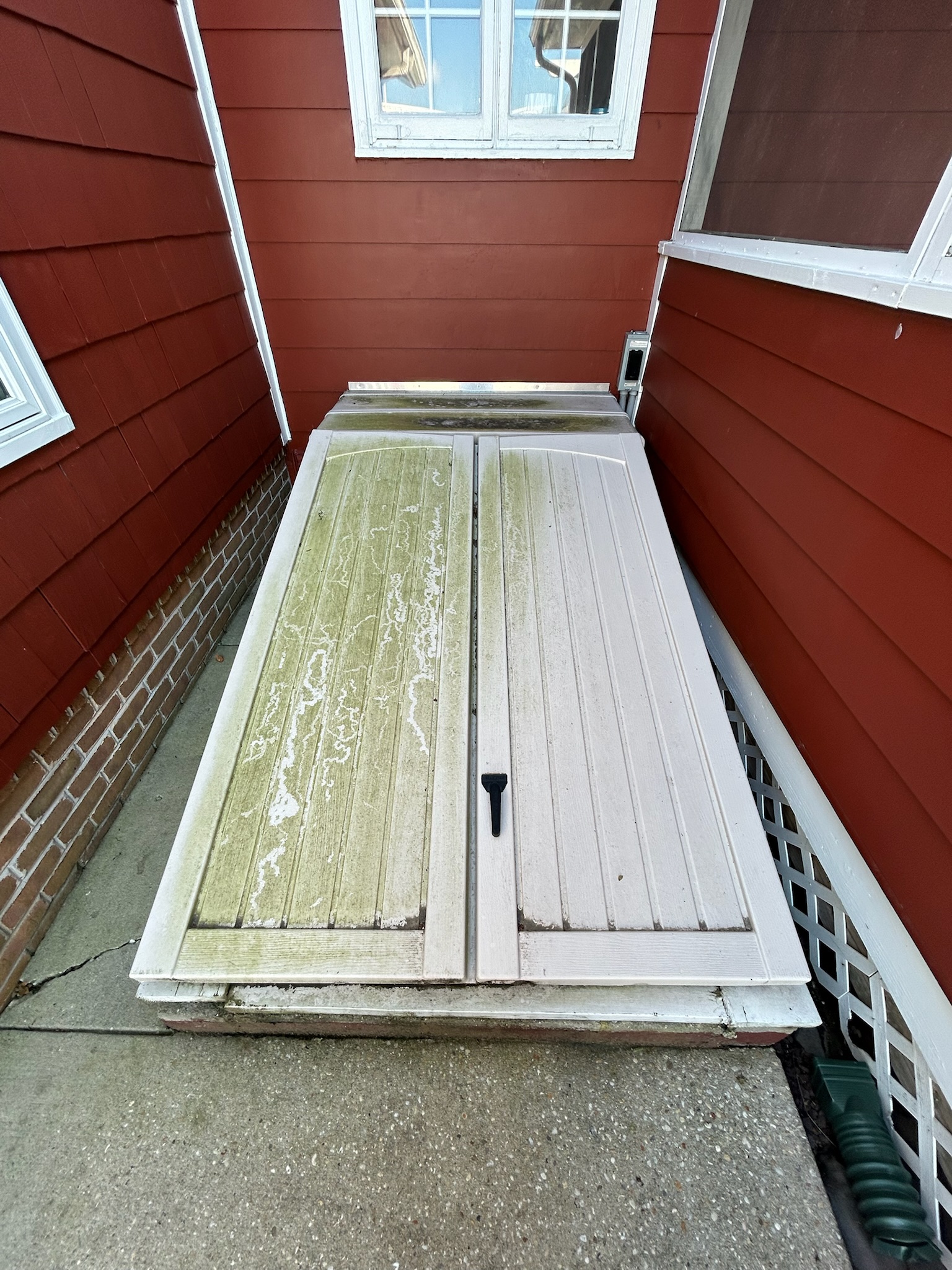 Before patio cleanup and surface cleaning